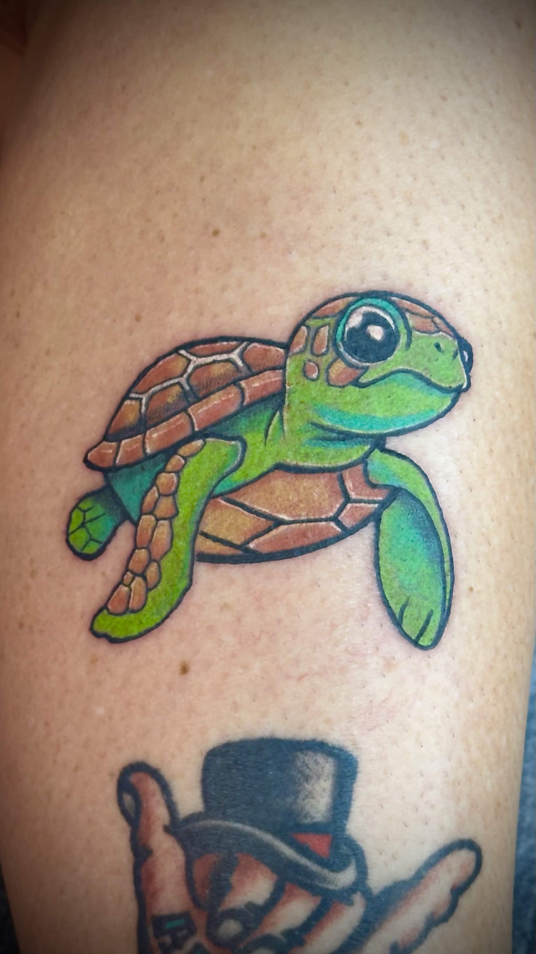 Baby sea turtle tattoo — great first tattoo by Spade in Waikiki